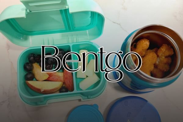 Close up image of Bentgo kid's snack container with fruit and food inside