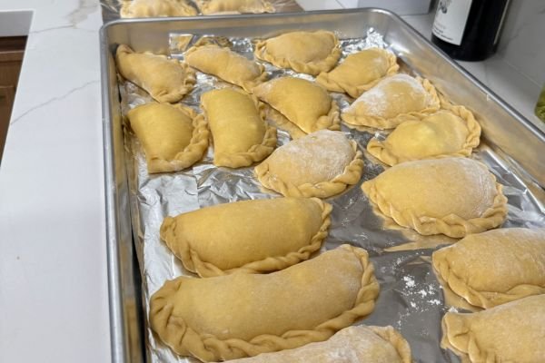 image of the finished pastelas sealed and stuffed, ready to fry in oil