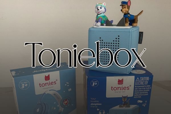 Close up image of kid's blue Toniebox set with tonies on top of the box