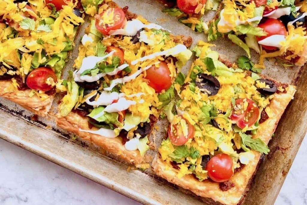 close up image of sheet pan taco bake recipe from Quiche my Grits