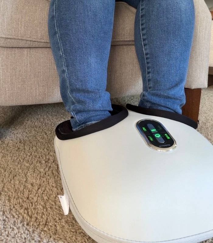 image of nekteck shiatsu foot massager being used by person in jeans